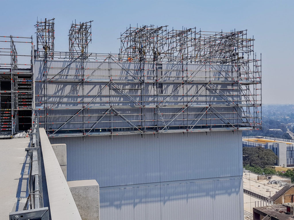 Above Scaffolding built this cantilevered scaffold for building repairs