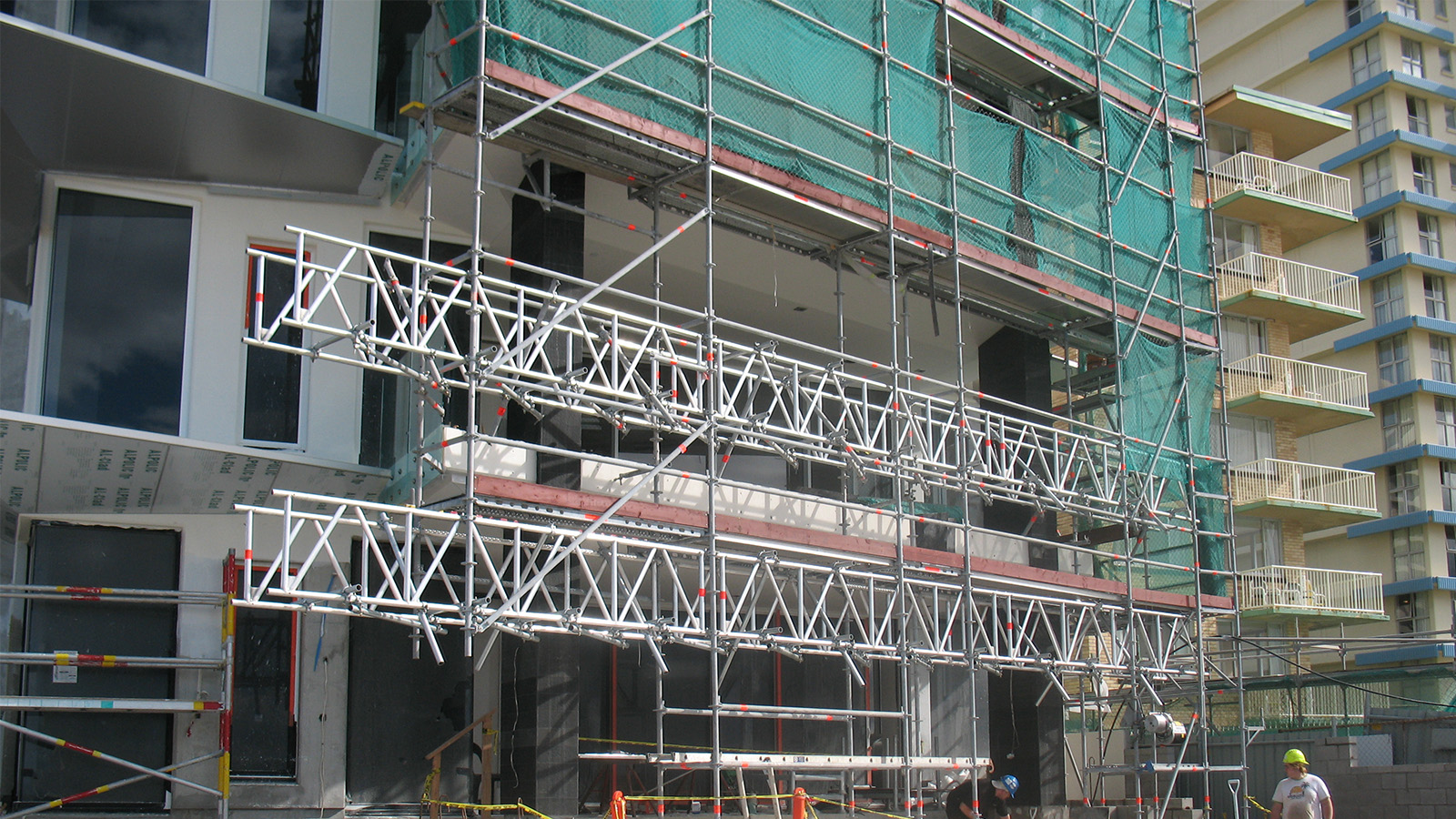 Layher lattice beams used to be build a scaffold bridge