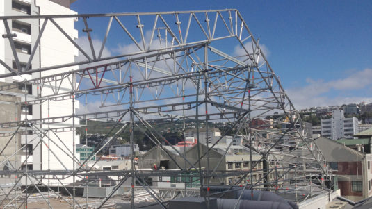 Layher Keder Roof System under construction on top of Les Mills building in Wellington