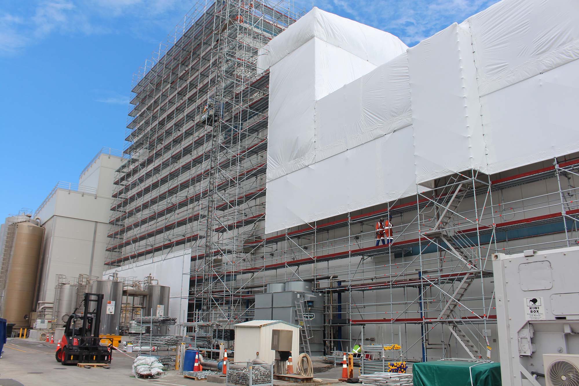 DIALOG Fitzroy use Layher Allround Scaffolding to encapsulate and provide façade access to this massive Fonterra Whey Protein Concentrate (WPC) building Taranaki
