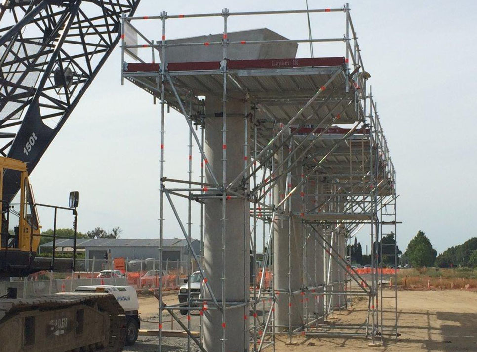 Space was at a premium so cantilevered Layher Allround scaffold was used to reduce ground footprint